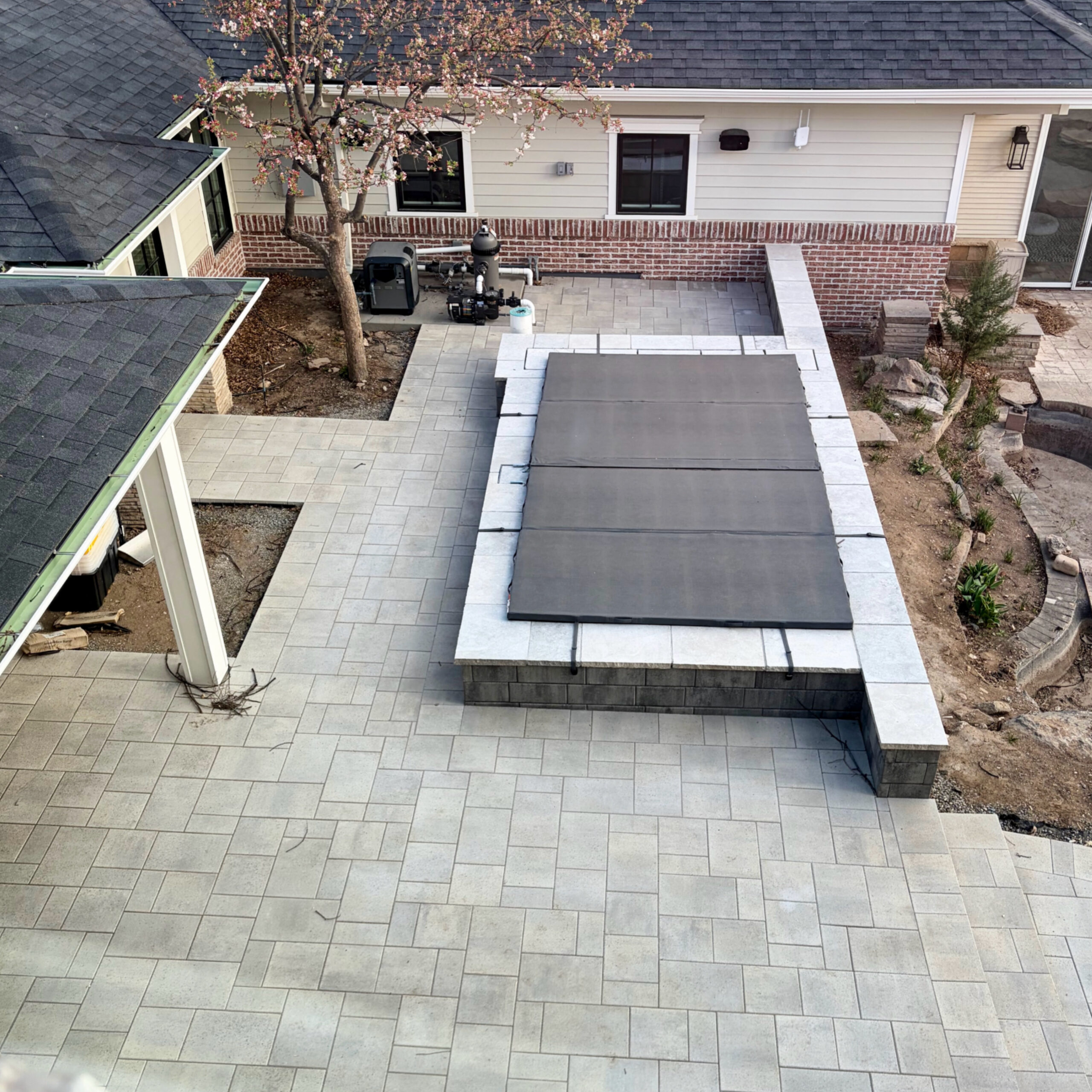 custom belgard paver patio with Soake plunge pool in Fort Collins Colorado by Summit Outdoor Living